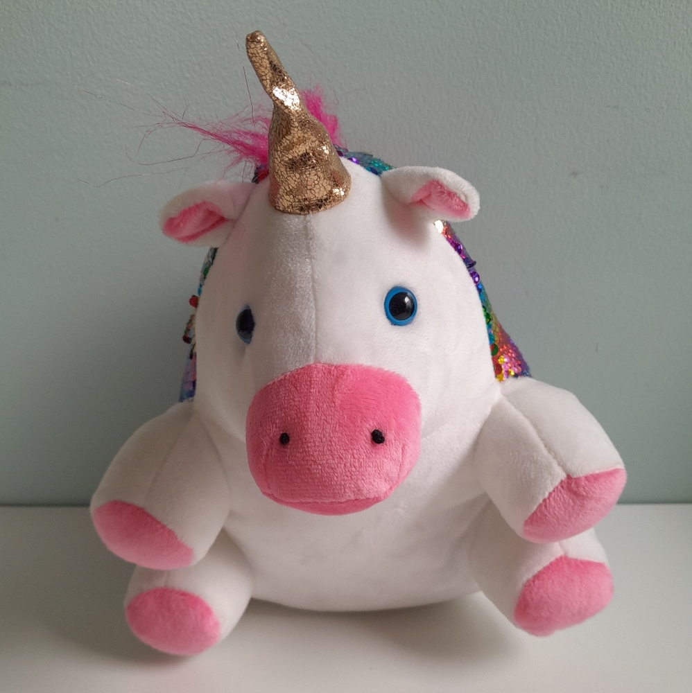 Weighted children's plush unicorn. Great waster present. Never used, no tags.